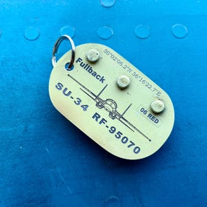 Pilot сollectable gifts planetags from the Russian Su-34 plane shot down over Kharkov on March 6, 2022 Aircraft Skin Keyring