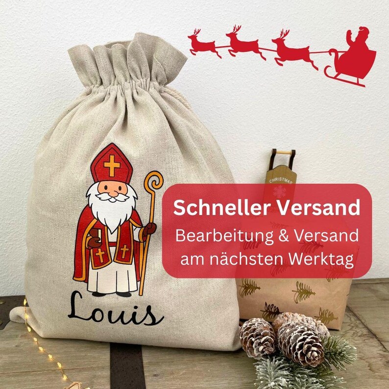 May include: A beige drawstring gift bag featuring a cartoon illustration of St. Nicholas in red and white robes, holding a staff. The name "Louis" is written below the illustration. A red banner with German text is visible.