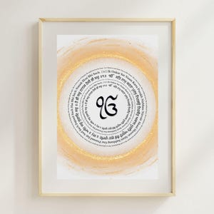 May include: A framed print with a gold background and a black circle containing the symbol "ੴ" and the text "Ik Onkar Sat Nam Karta Purkh Nirbhau Nirvair Akaal Moorat Ajooni Saibhang Gur Parsad Jap Aadi Sach Jugad Sach Hai Bhee Sach Nanak Hosi Bhee Sach", which is a mantra in the Sikh religion.