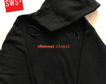 Orange sweatshirt best sale with black writing