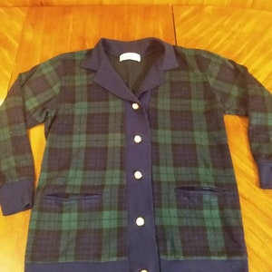 Medium blue and green plaid long sweater. No holes or stains.