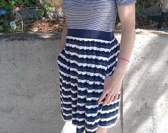 Blue and white striped stretchy cotton peasant dress with pockets, from Anthropologie, size medium.