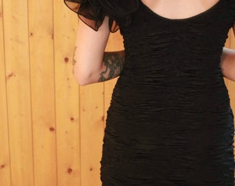 Vintage Black Cocktail Dress Size Small. With poofy sleeves.