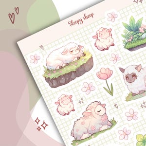May include: A sheet of stickers featuring cute cartoon sheep in various poses, including sleeping, sitting, and lying down. The stickers are on a white background with a grid pattern and feature pink flowers and green leaves. The text "Sleepy sheep" is at the top of the sheet.