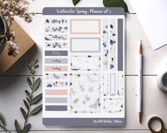 May include: A set of watercolor spring planner stickers with a floral and butterfly design. The stickers include various sizes and shapes of boxes, banners, and notes. The text "Today" appears on several of the stickers. The text "Watercolor Spring - Planner set 1" and "Nicolelle Sketches Stickers" are also included.