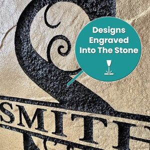 May include: A close-up of a stone house number with the number "2" and the last name "SMITH" engraved into the stone. The text "Designs Engraved Into The Stone" is in a circle with a download icon.