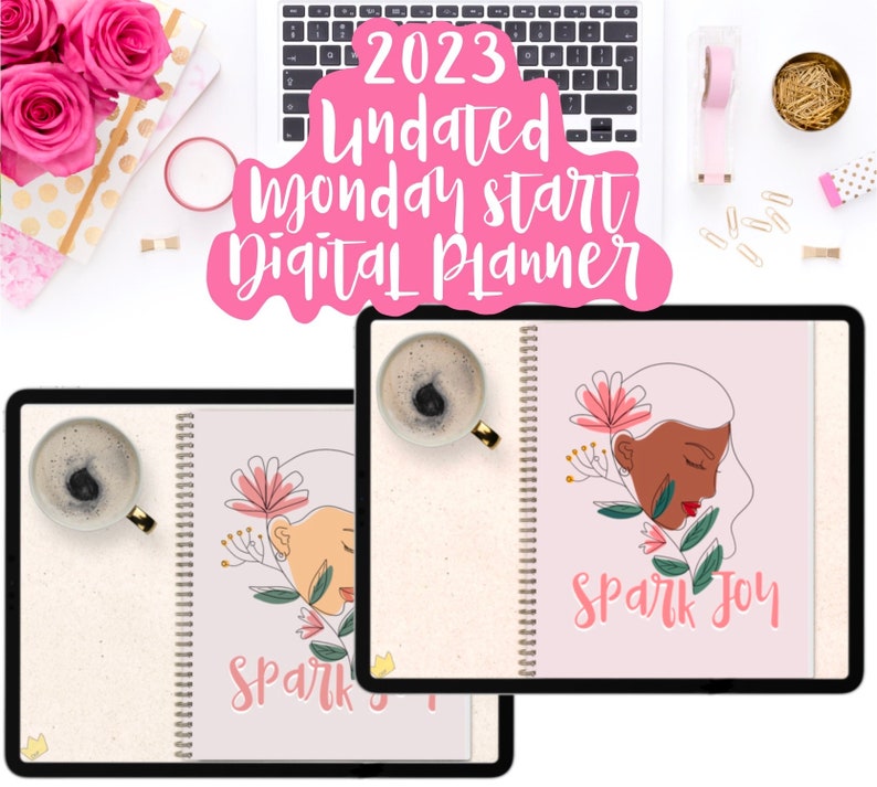 May include: Two digital planners with pink covers and floral designs. The covers feature the text "Spark Joy". The planners are on a white surface with a laptop, coffee cup, and other office supplies.