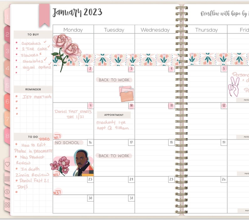May include: A monthly planner with a pink and green floral design. The planner has a wire-o binding and includes sections for "To Buy", "Reminder", "To Do", and "Video". The planner also includes sections for "Back to Work" and "No School".