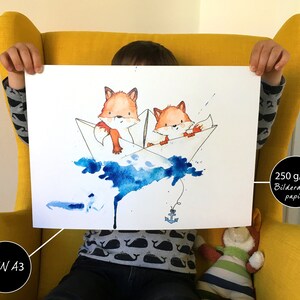 May include: Two orange foxes in paper boats on a blue watercolor background with a small anchor at the bottom. The print is on 250 g/qm photo paper and is DIN A3 size.