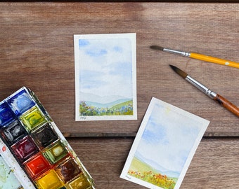 Mini pittura ad acquerello estivo di fiori selvatici