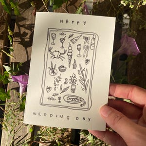 Tarjeta de boda dibujada a mano con el mensaje "Feliz día de la boda" - Para los novios