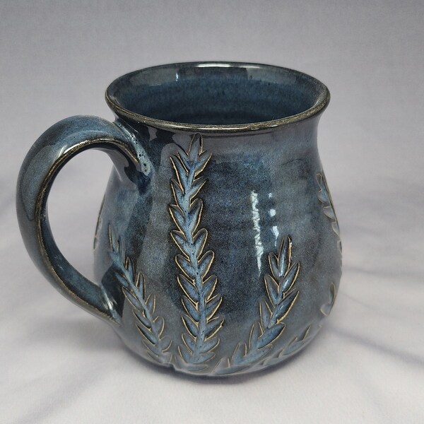 Hand carved bellied vine mug in midnight blue glaze