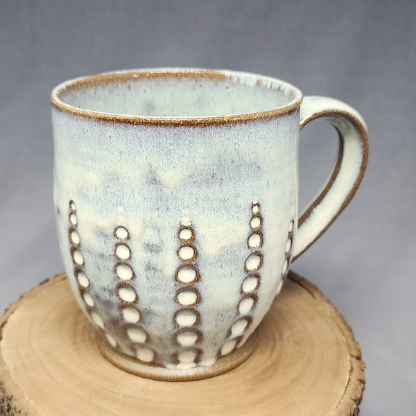 Rustic pebble mug in honey flux and bare clay mug