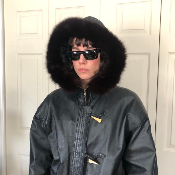 apocalypse leather and fur bomber