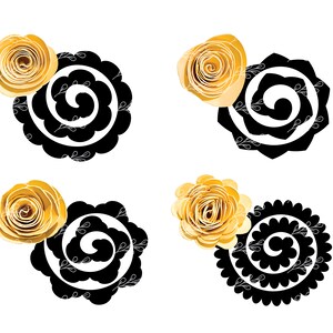 May include: Four black and white swirl designs with a yellow paper flower on top of each design.