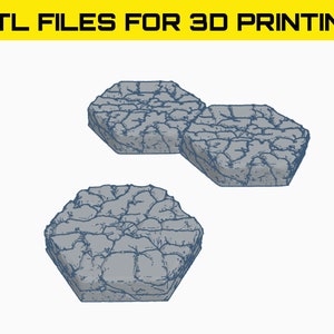 May include: Three grey, hexagonal stone tiles with a cracked surface are displayed against a white background. The text ".STL FILES FOR 3D PRINTING" is in a yellow banner at the top. These tiles are designed for 3D printing.