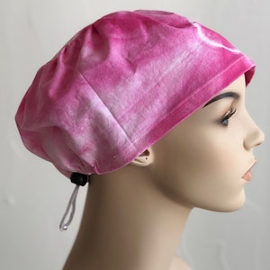 Pink Shibori spiral tie dyed scrub caps