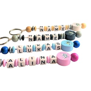 Keychain with name and crown made of wood