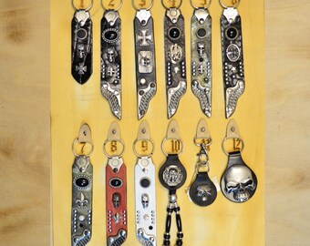 Keychain with wings, skull and biker style