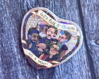 Gay Pirates Talk It Through As A Crew Izzy Hands Heart Shaped Badge