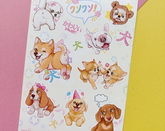 May include: A sheet of stickers featuring adorable cartoon dogs in various poses. The stickers are on a white background with pink, blue, and yellow accents. The text "Kawaii" and "Woof Woof!" are written on the stickers.