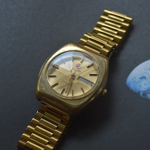 Alba watch deals gold plated price
