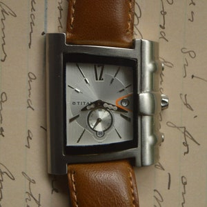 Titan watch 1586sda shop price
