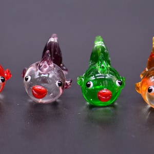 Ornement en verre poisson rouge