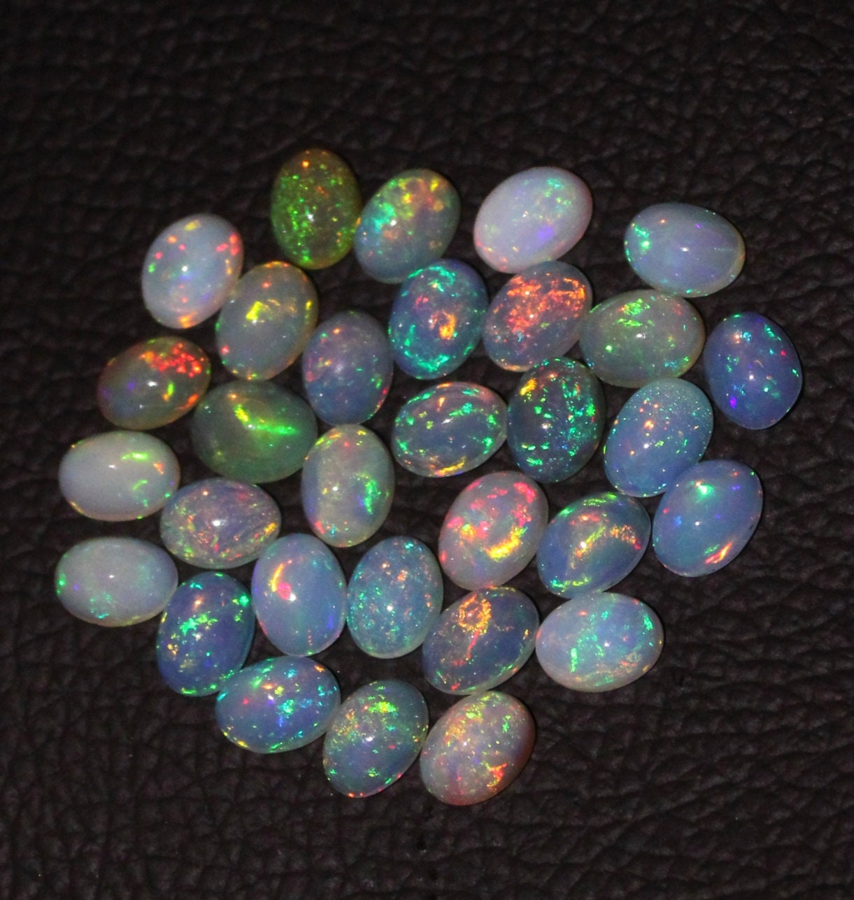 ETHIOPIAN WELO OPAL 12x10 MM OVAL CUT MULTI FIRE FACETED CALIBRATED ALL NATURAL 