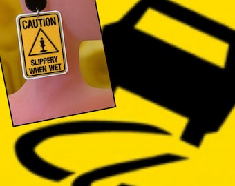Precaución - Resbaladizo cuando está mojado - Pendientes colgantes