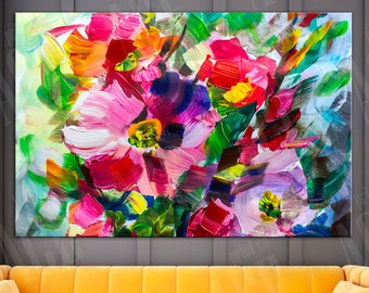 May include: An abstract floral painting with vibrant brushstrokes in shades of pink, red, orange, and green. The artwork hangs above a yellow velvet sofa with two matching throw pillows. The painting's colors contrast with the sofa's hue.