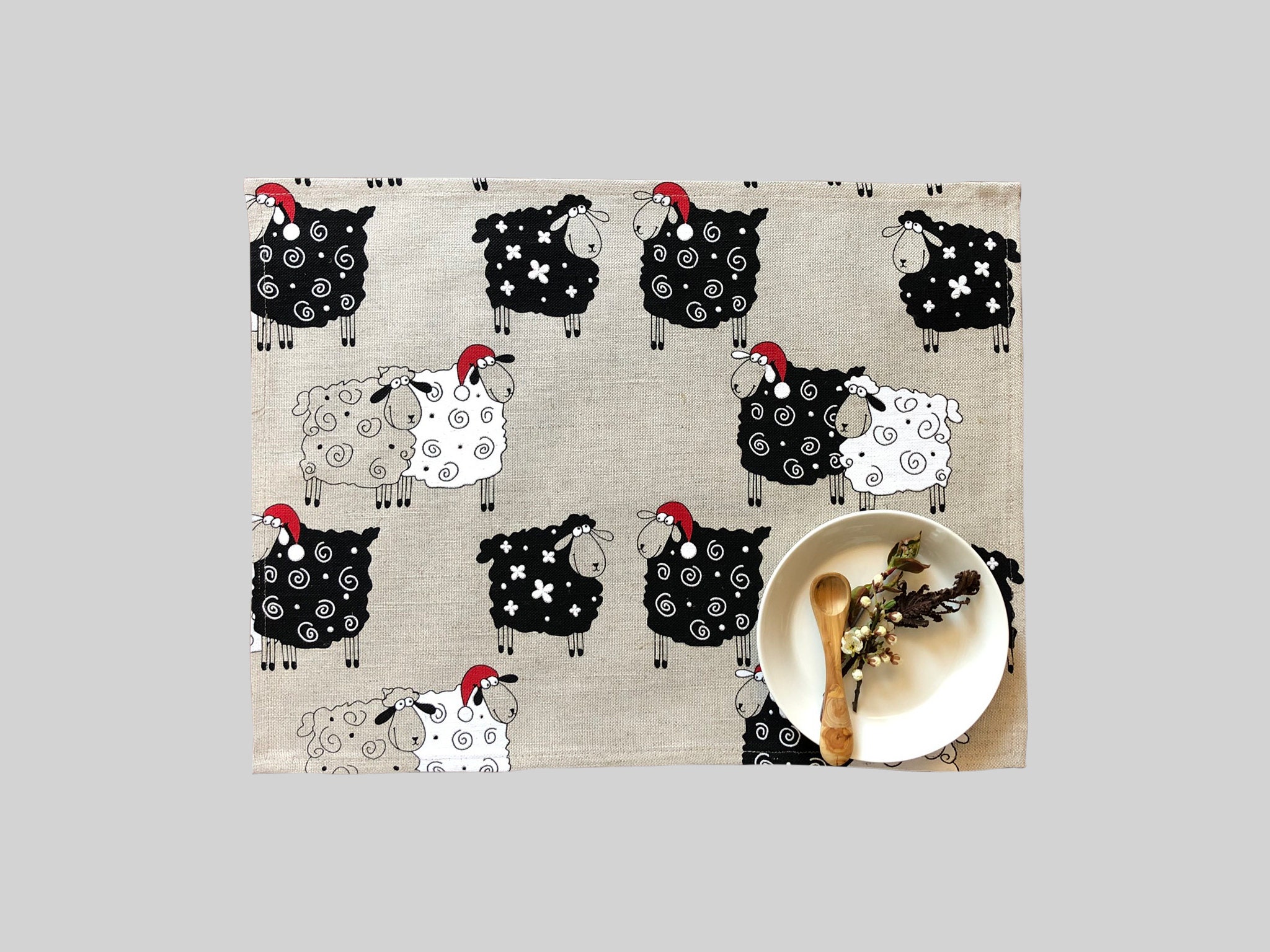 Natuurlijk linnen placemat met kerst schapen patroon print. Schapen