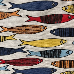 May include: A white fabric with a repeating pattern of colorful fish. The fish are in various shades of red, orange, yellow, blue, and black. The fish are stylized and have a simple design.