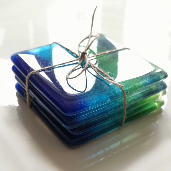 Drinks coaster tiles, handmade from recycled glass in blues and greens. Perfect for a new flat or house gift