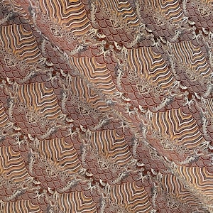 May include: A brown and gold fabric with a repeating pattern of stylized clouds and waves. The fabric has a textured, woven look.