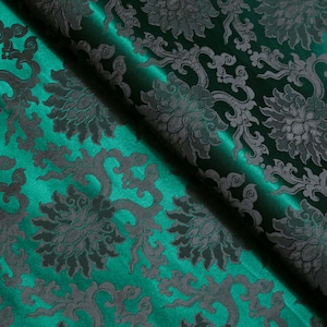 Tessuto broccato floreale: jacquard verde scuro e nero, larghezza 29&quot;