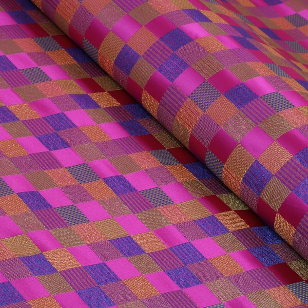 Fuchsia checker pattern brocade fabric. 36 inches wide.