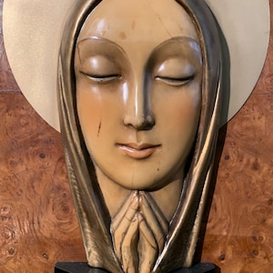 Sculpture of the Madonna in ceramic on wood, produced in the 70s