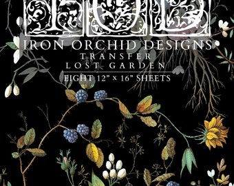 May include: Iron Orchid Designs transfer sheet for crafting, featuring a floral pattern with pink, white, and yellow flowers on a black background. The sheet is labeled "Lost Garden" and includes eight 12" x 16" sheets.