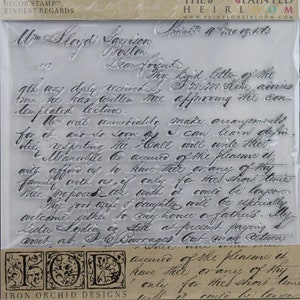 May include: A clear rubber stamp with a vintage handwritten letter design. The stamp features the text "Mr. Lloyd Garrison Boston" and a portion of a letter written in cursive script. The stamp is labeled "Iron Orchid Designs" and "The Painted Heirloom".