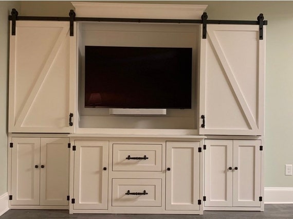 Entertainment center with barn doors discount