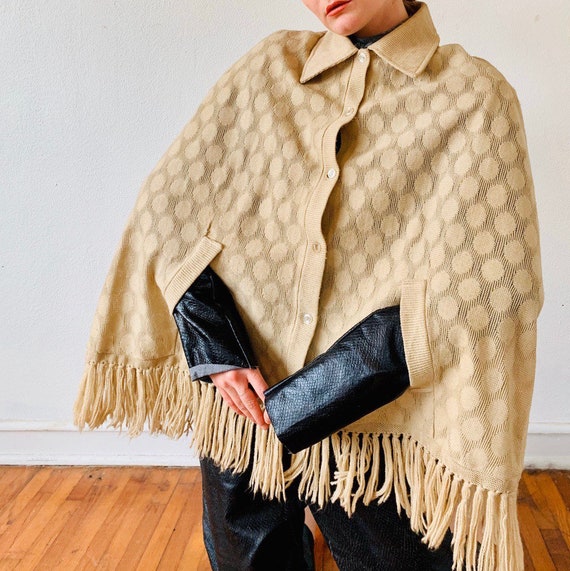 1970’s Honeycomb Fringed Cape with dagger collar.