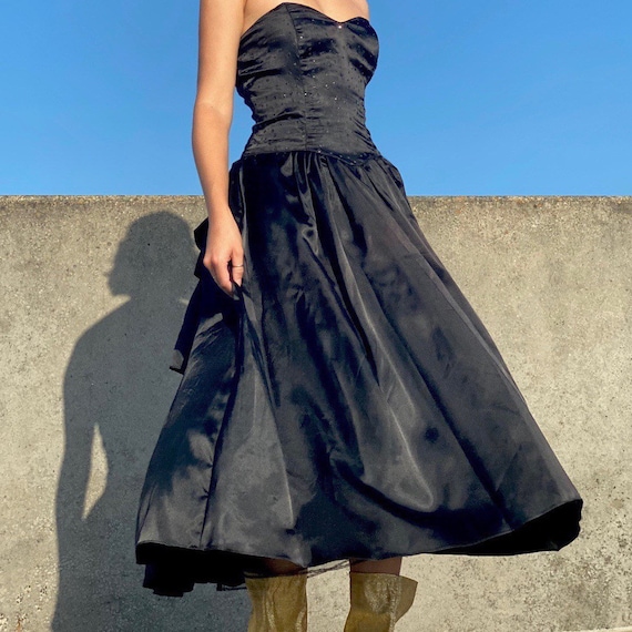 80s black satin strapless dress.