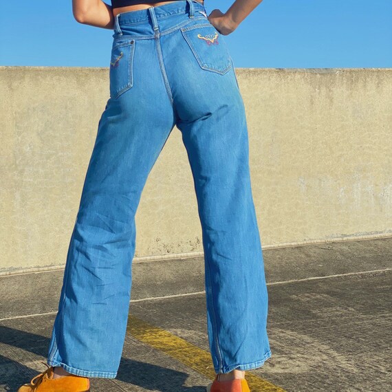 Vintage 70s wrangler butterfly bell bottoms.