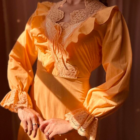 1970s Victorian revival orange lace maxi dress