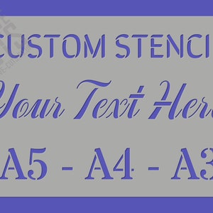 May include: A grey stencil with the text "CUSTOM STENCIL" at the top, "Your Text Here" in a cursive font in the middle, and "A5 - A4 - A3" at the bottom.