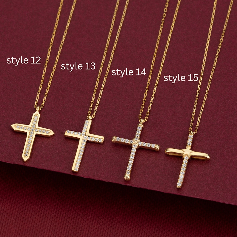 May include: Four gold necklaces with different styles of diamond cross pendants. The necklaces are labeled "style 12", "style 13", "style 14", and "style 15".