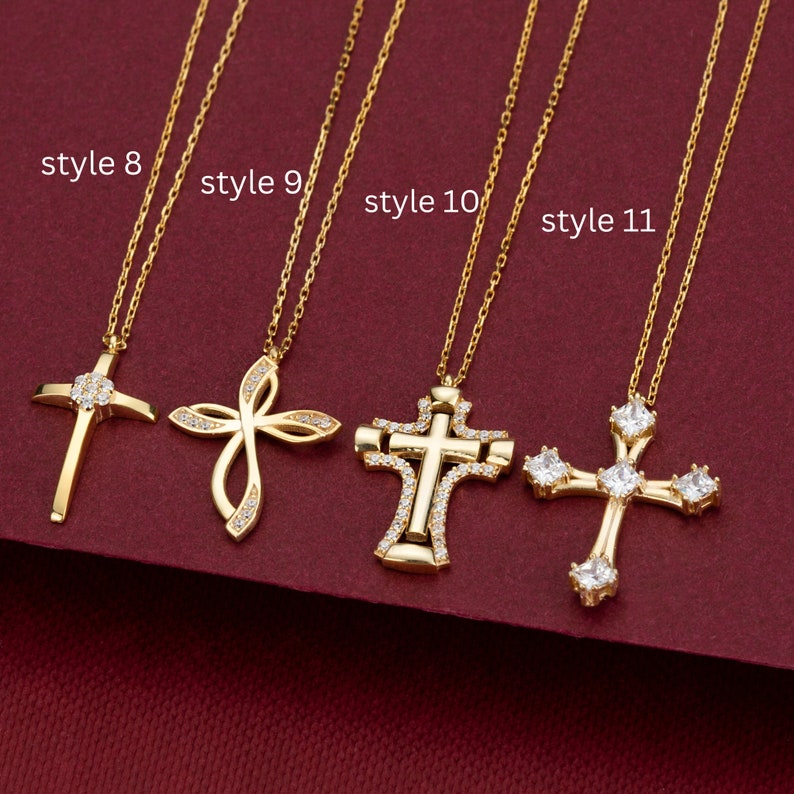 May include: Five gold necklaces with different styles of cross pendants. The crosses are adorned with clear cubic zirconia stones. The necklaces are labeled "style 8", "style 9", "style 10", and "style 11".