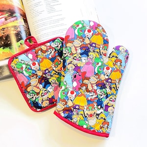 May include: A fabric oven mitt and a square pot holder featuring a colorful, repeating pattern of various Nintendo video game characters including Mario, Luigi, Princess Peach, Toad, Yoshi, Donkey Kong, and Bowser, all finished with bright red trim.
