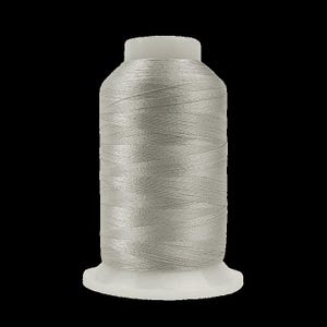 May include: A spool of silver-gray thread. The thread is tightly wound around a cylindrical core, with a white base and top. The thread has a subtle sheen, suggesting a smooth texture. The background is solid black.